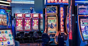 Permainan Bonanza Gold di ion slot menampilkan grid slot 6x5 dengan simbol berwarna-warni dan fitur cascade